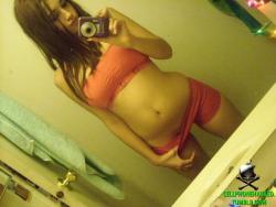 A busty teen bombshell took some sexy selfpics  6/65