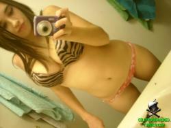 A busty teen bombshell took some sexy selfpics  38/65