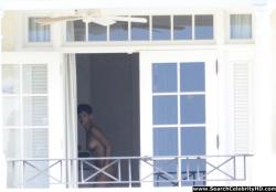 Rihanna naked ass and topless boobs candids through her balcony window - celebrity 12/40