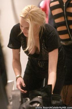 Lindsay lohan - braless boob-slip at intermix in soho - celebrity 2/20