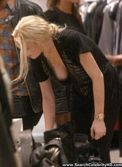 Lindsay lohan - braless boob-slip at intermix in soho - celebrity 6/20