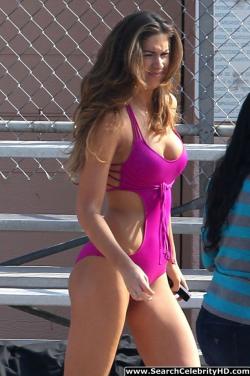 Katherine webb rocks a hot pink cut-out bathing suit 2/33