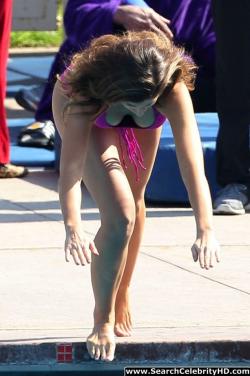 Katherine webb rocks a hot pink cut-out bathing suit 11/33