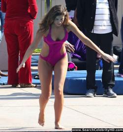 Katherine webb rocks a hot pink cut-out bathing suit 13/33