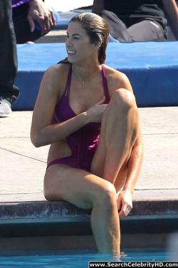 Katherine webb rocks a hot pink cut-out bathing suit 26/33