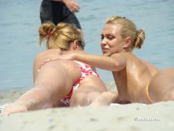 Topless girls on the beach - 202 38/44