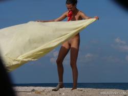 Nude girls on the beach - 211 34/49