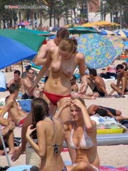 Topless girls on the beach - 034 23/47