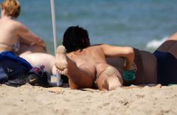 Nude girls on the beach - 250 13/36