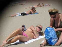 Topless girls on the beach - 284 3/49