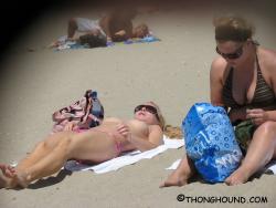 Topless girls on the beach - 284 5/49