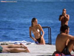 Topless girls on the beach - 035 34/37