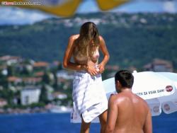 Topless girls on the beach - 035 35/37