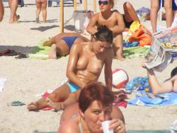Topless girls on the beach - 146 41/42