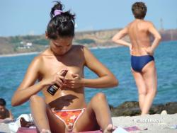 Topless girls on the beach - 084 17/41