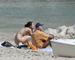 Nudist daughter and father at the beach cmnf 2/2